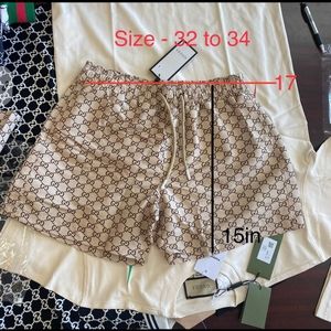 SOLD OUT🎉🎉🎉Authentic Gucci Men. Dress & Swim Short Combo. Size M & L